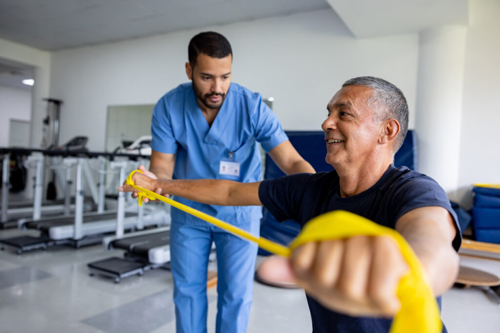 physical therapist working with a patient
