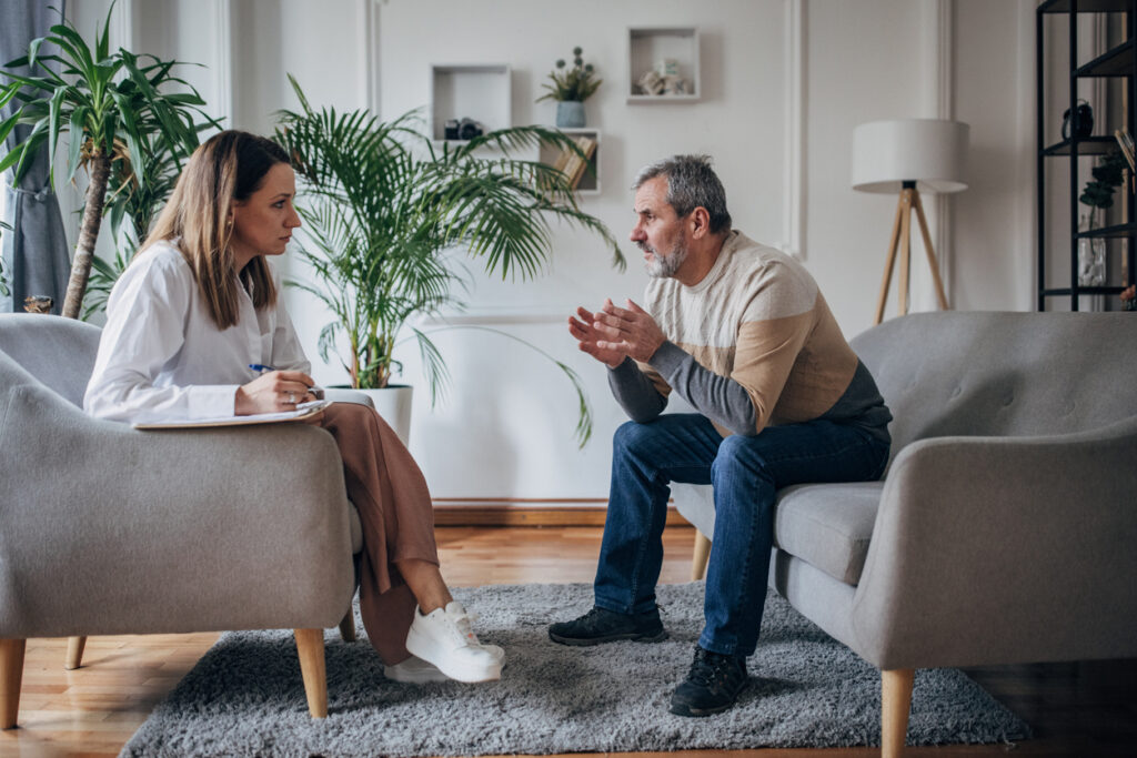 male patient at a therapy session