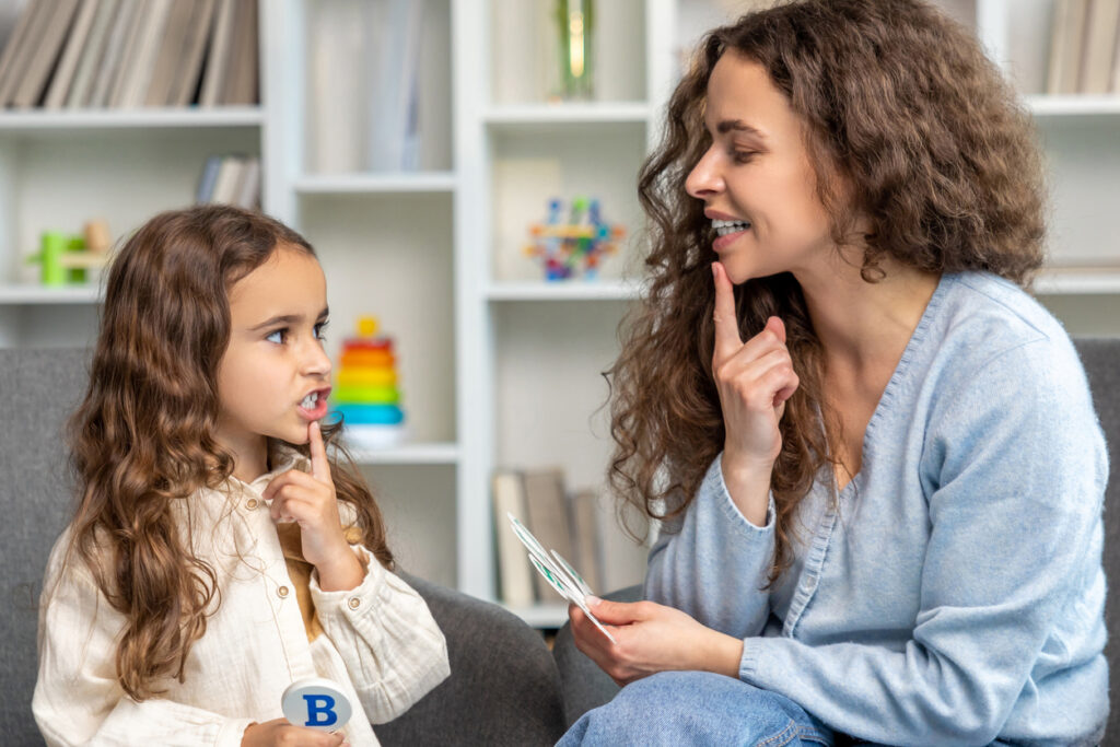speech therapist working with a child