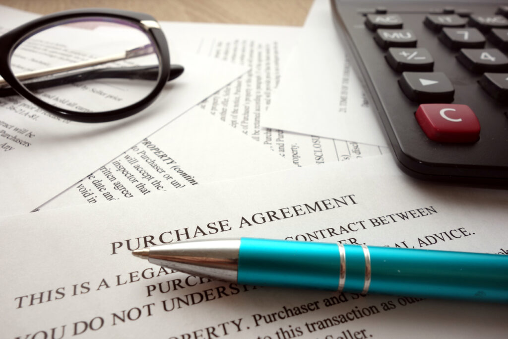 Purchase agreement document for the sale of a busines